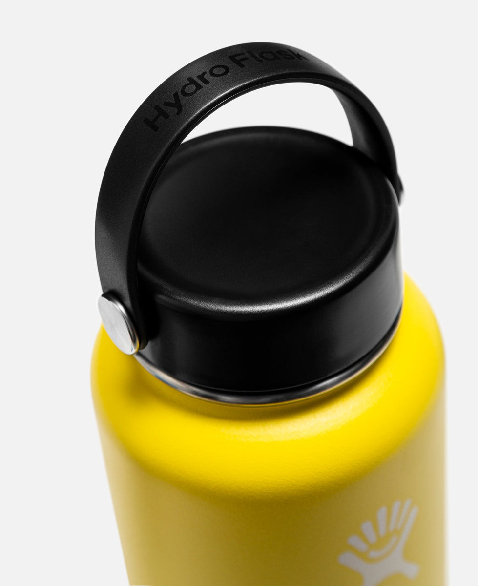 http://juicestore.com/cdn/shop/products/clot-x-hydro-flask-32oz-wide-mouth-water-bottle-ss21-accessories-yellow-product-shot-3_4b0a77ac-c52a-483c-bb48-f4e4574637e7_1200x1200.jpg?v=1682071630